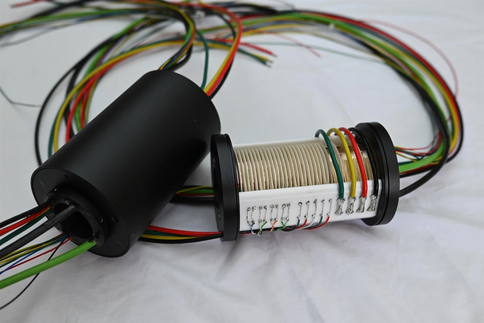 Real ByTune internal slip ring contact assembly with ring stack wiring and housing Real ByTune internal slip ring contact assembly with ring stack wiring and housing